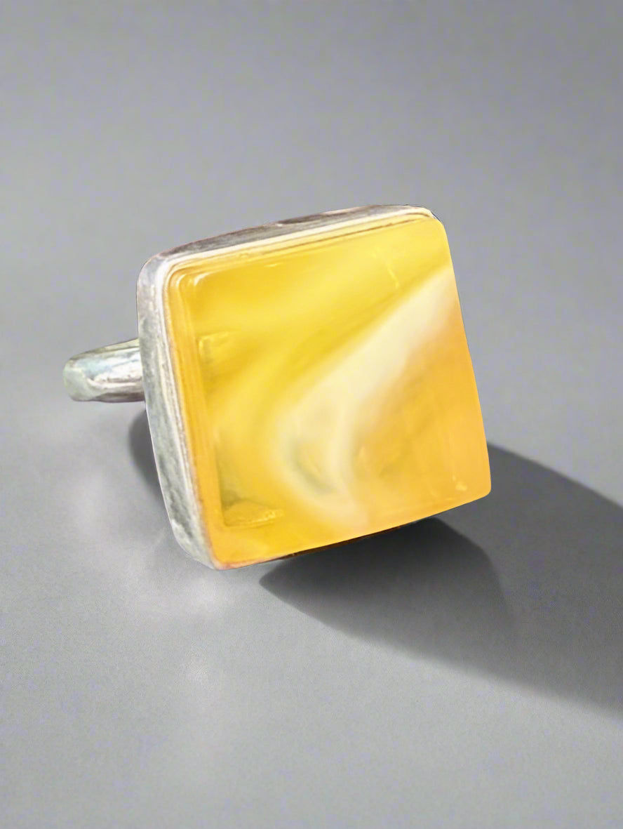 Square-cut yellow Baltic amber ring