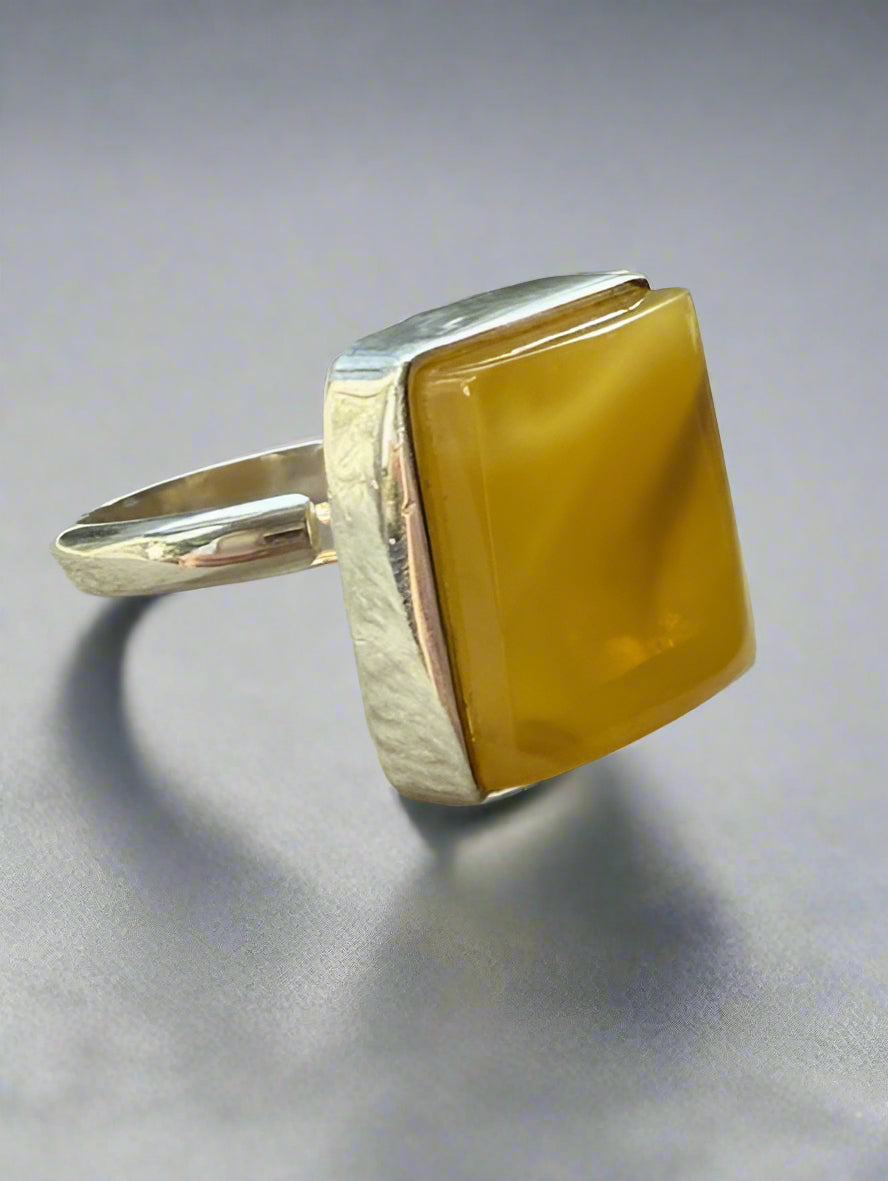 Square-cut yellow Baltic amber ring