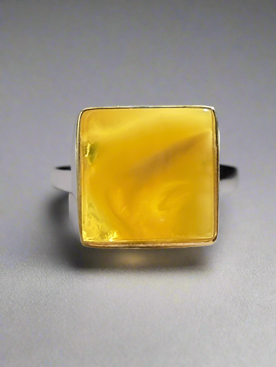 Square-cut yellow Baltic amber ring