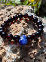 Load image into Gallery viewer, Cherry Amber with Blue Sapphire (September Birthstone)
