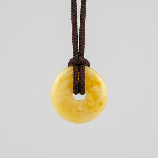 Amber Donut Pendant – Prosperity & Balance