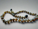 Load image into Gallery viewer, Green Raw Baltic Amber Necklace
