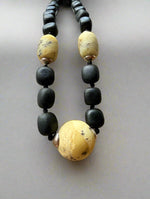 Load image into Gallery viewer, Fossilized Beauty: Amber Bead Men&#39;s Necklace
