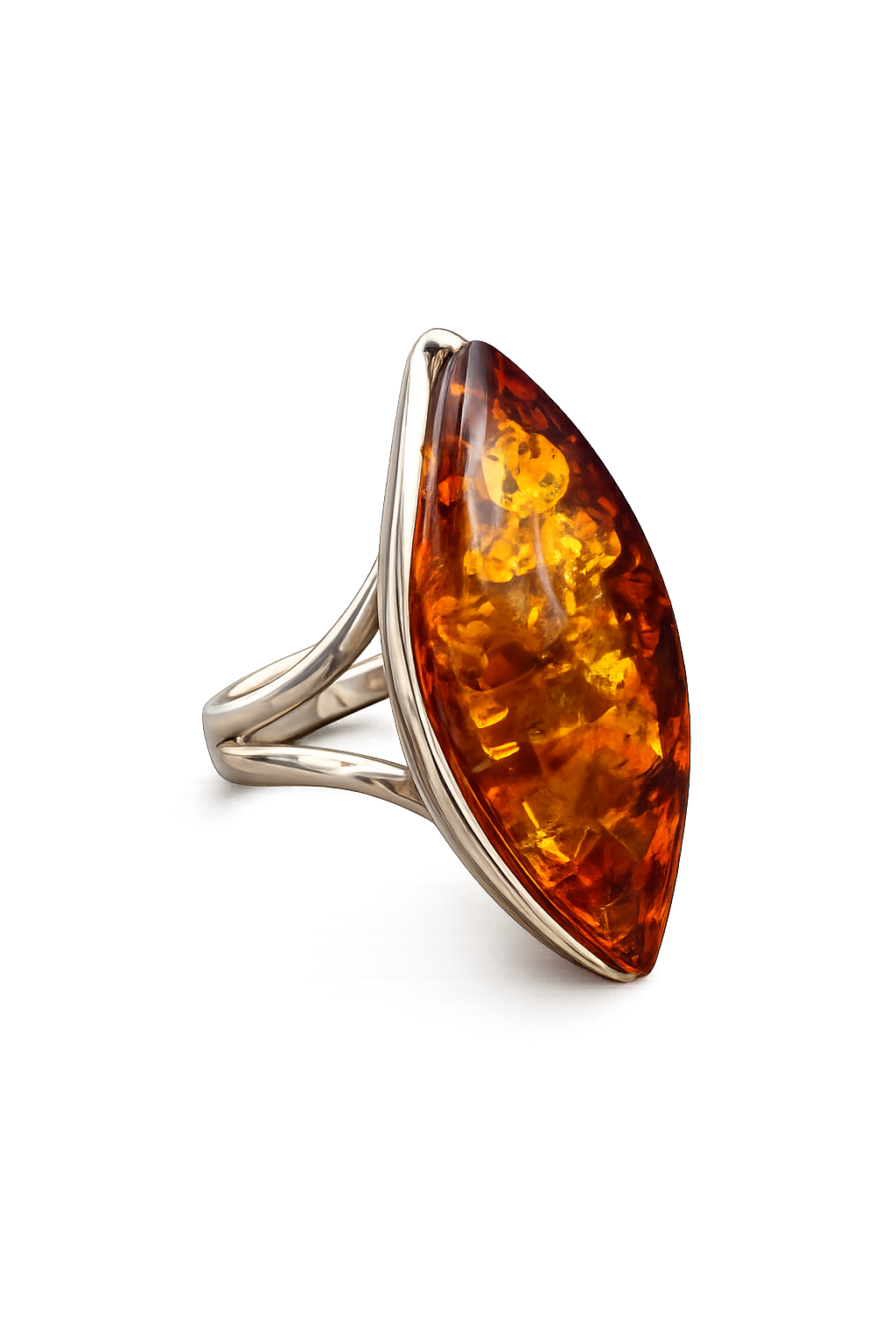 Silver ring with a large amber stone on a white background