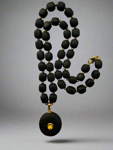 Sculpted Amber Pendant Necklace