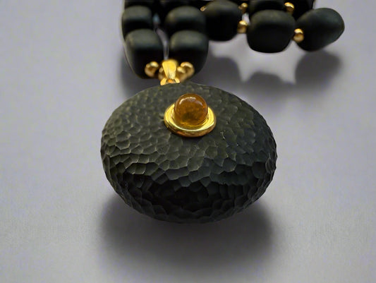 Sculpted Amber Pendant Necklace