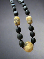 Load image into Gallery viewer, Fossilized Beauty: Amber Bead Men&#39;s Necklace
