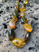 Load image into Gallery viewer, Unique Green Amber Necklace
