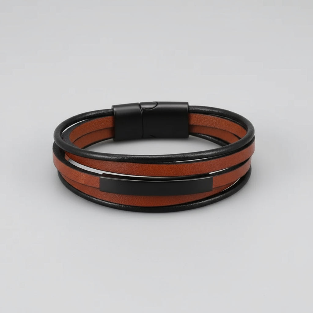 Multistrand leather bracelet with black clasp on a wooden surface