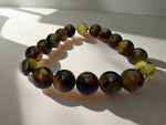 Load image into Gallery viewer, Mystic Grove: Green Amber Elegance Bracelet

