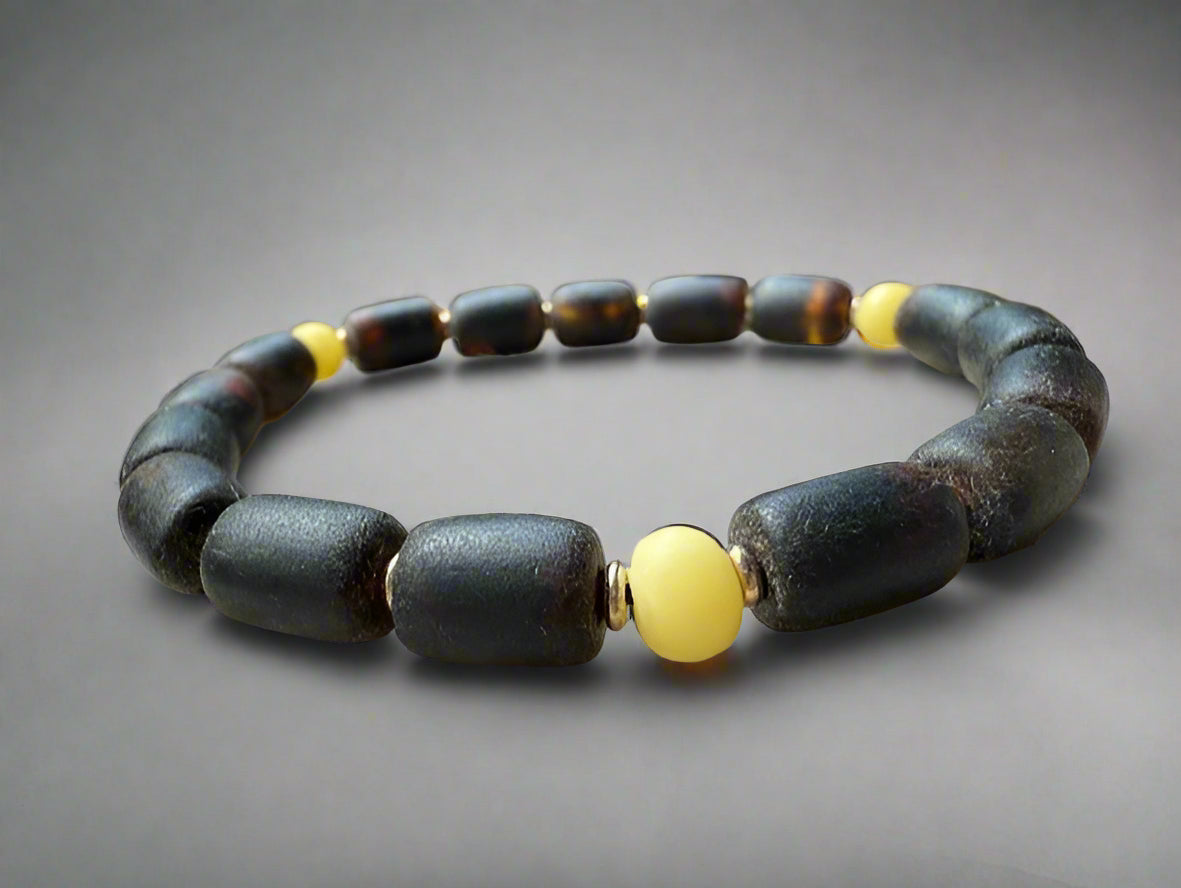 Subtle White Inclusions: Black Amber Bracelet