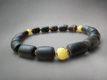 Load image into Gallery viewer, Subtle White Inclusions: Black Amber Bracelet
