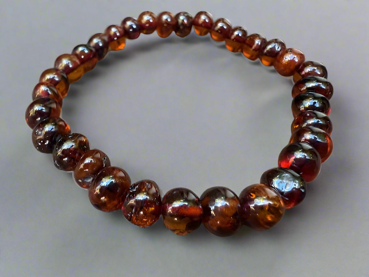 Brown beaded bracelet on a wooden surface
