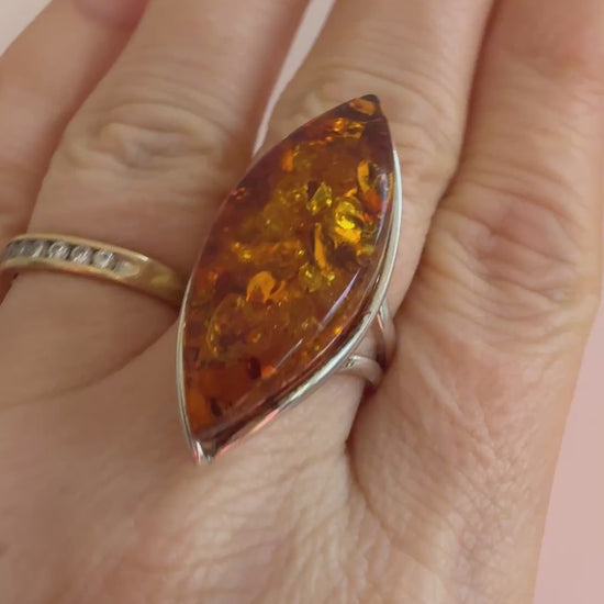 amber ring video on a hand 