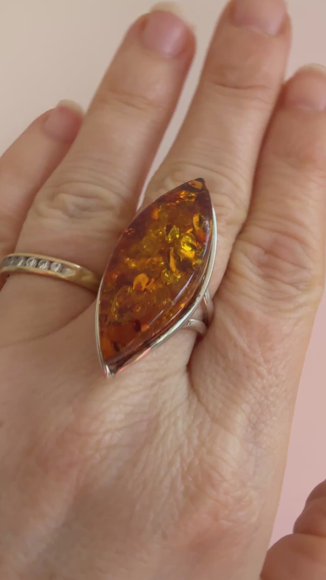 amber ring video on a hand 