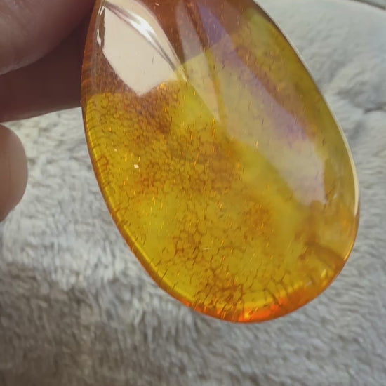 polished amber pendant video 