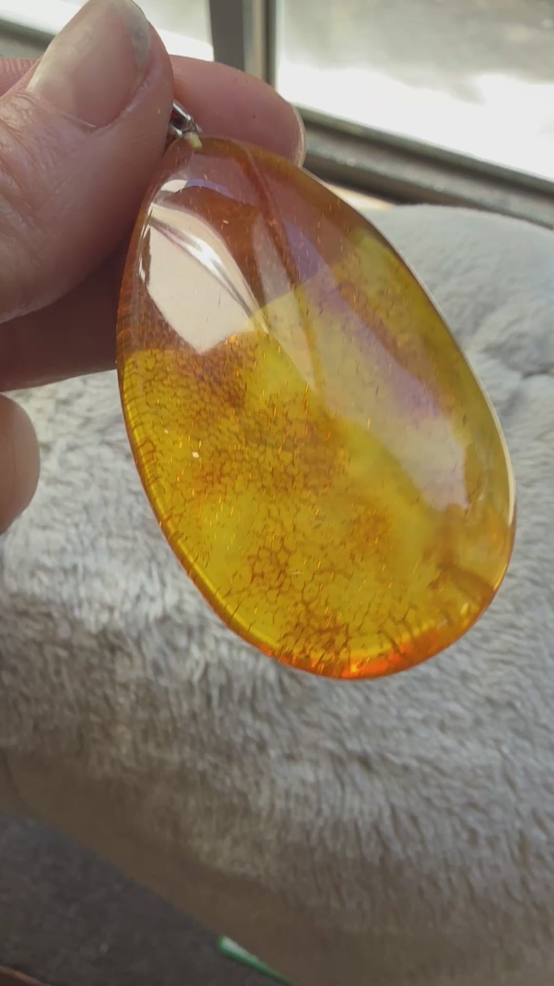 polished amber pendant video 