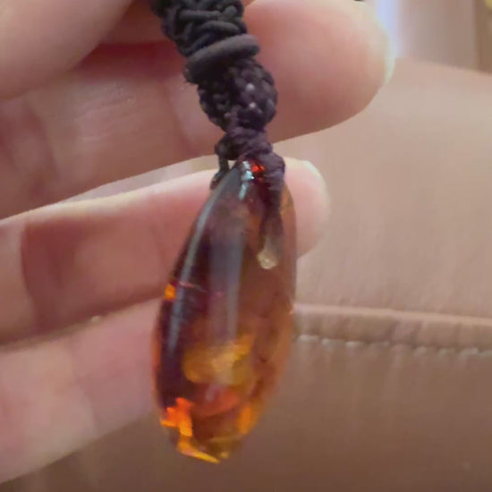video of amber mans pendant 