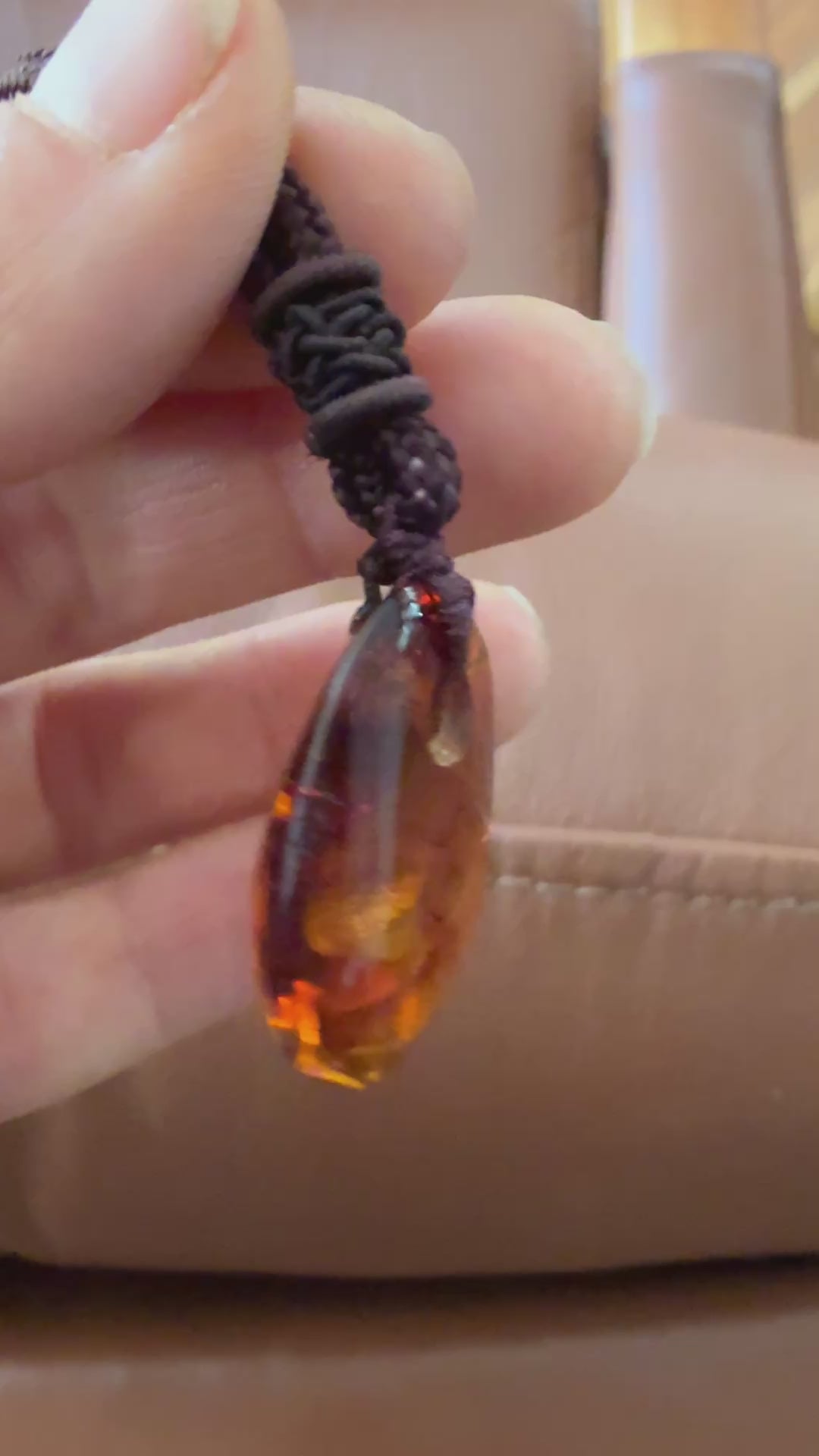 video of amber mans pendant 
