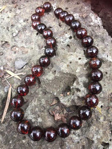 Red amber on sale necklace