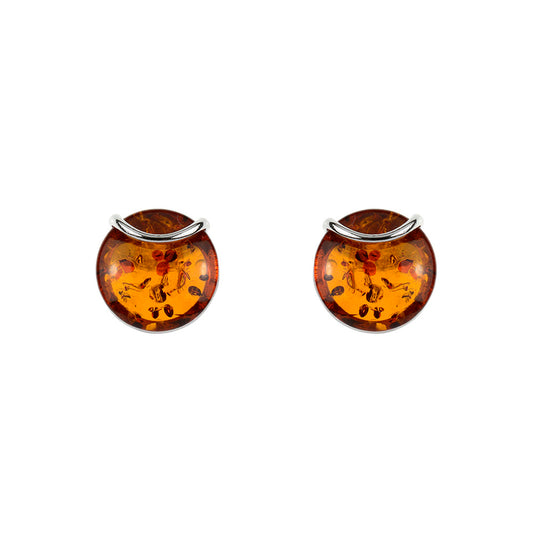 A pair of small round green amber earrings with silver finish set against a white background.